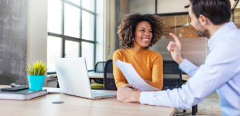 Female manager broker discussing business with customer